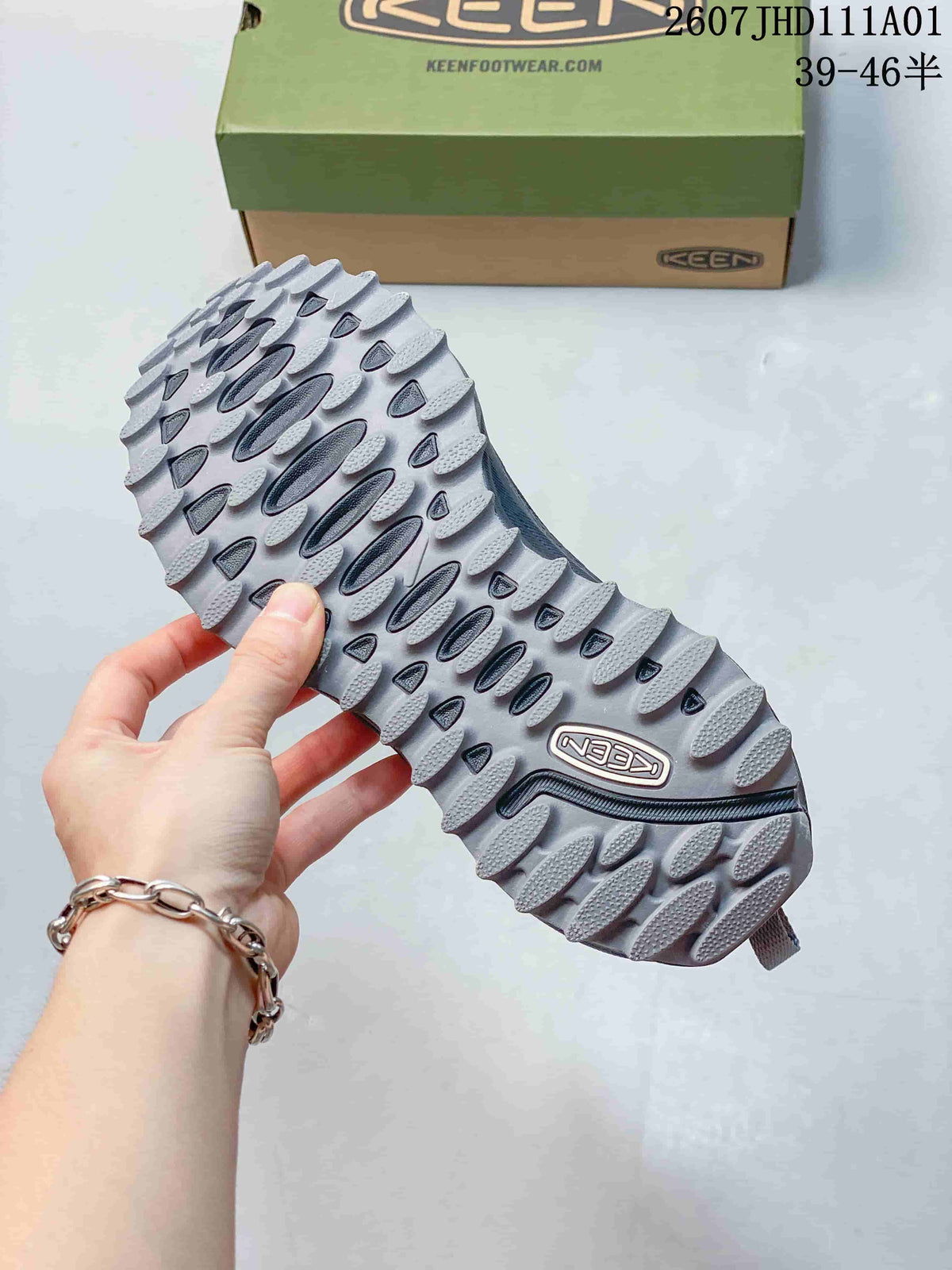 Close-up of the lugged outsole on a gray Keen Zionic ADV shoe