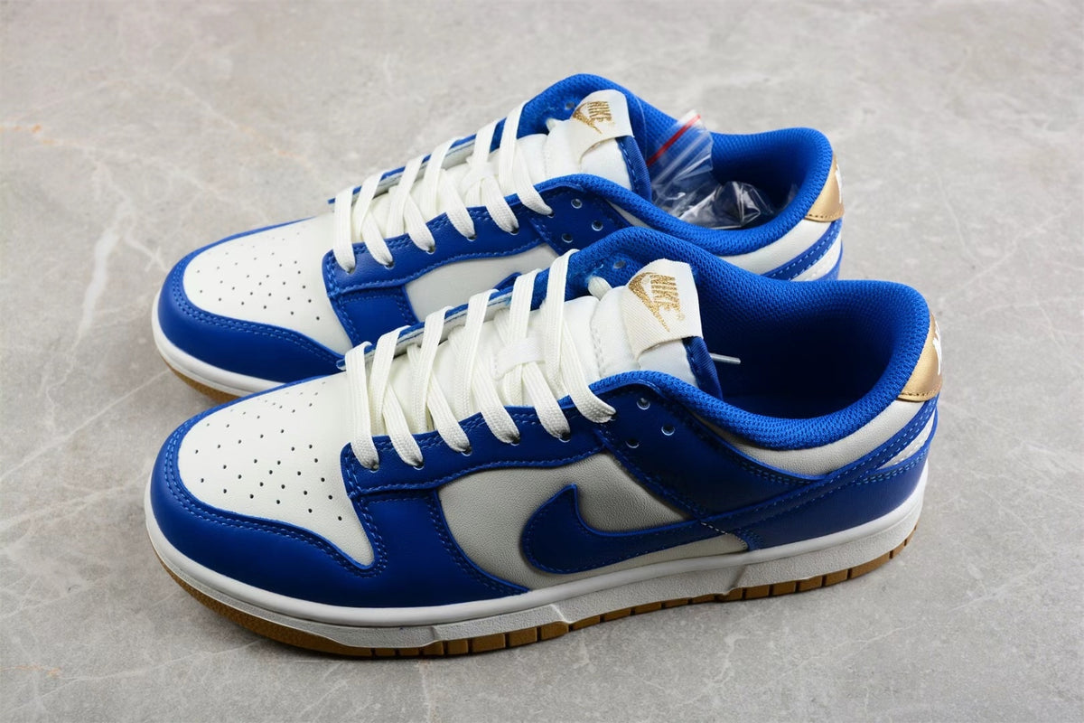 Pair of white and blue low-top sneakers shown from an angled side view.