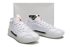 White Jordan 39 shoes displayed with a shoebox.