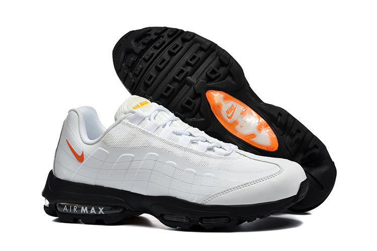 Nike Air Max White and Black Sneakers with Orange Swoosh
