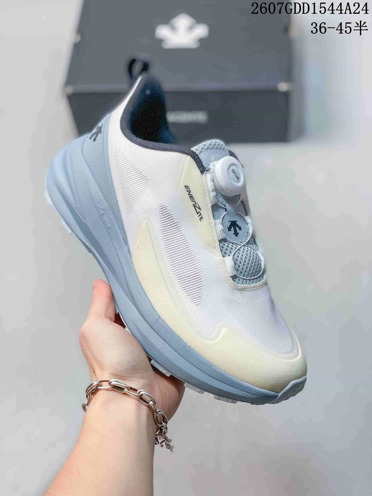 Angled side view showing the white and light blue colorway, side detailing, heel pull tab, and dial closure.