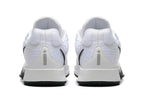 Rear view showing the white heel panels and black outsole