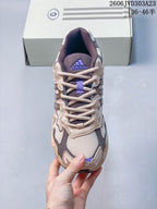 Top view of the sneaker showing its laces, mesh-like panels and tongue logo