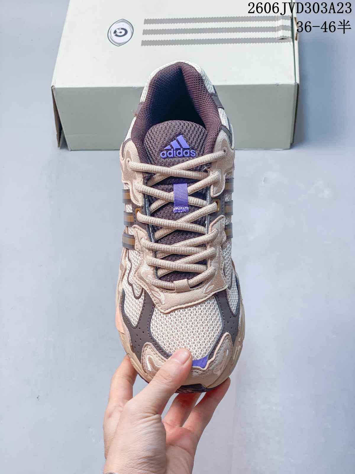 Top view of the sneaker showing its laces, mesh-like panels and tongue logo