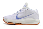 Side profile of the white and blue Nike GT Hustle 3.