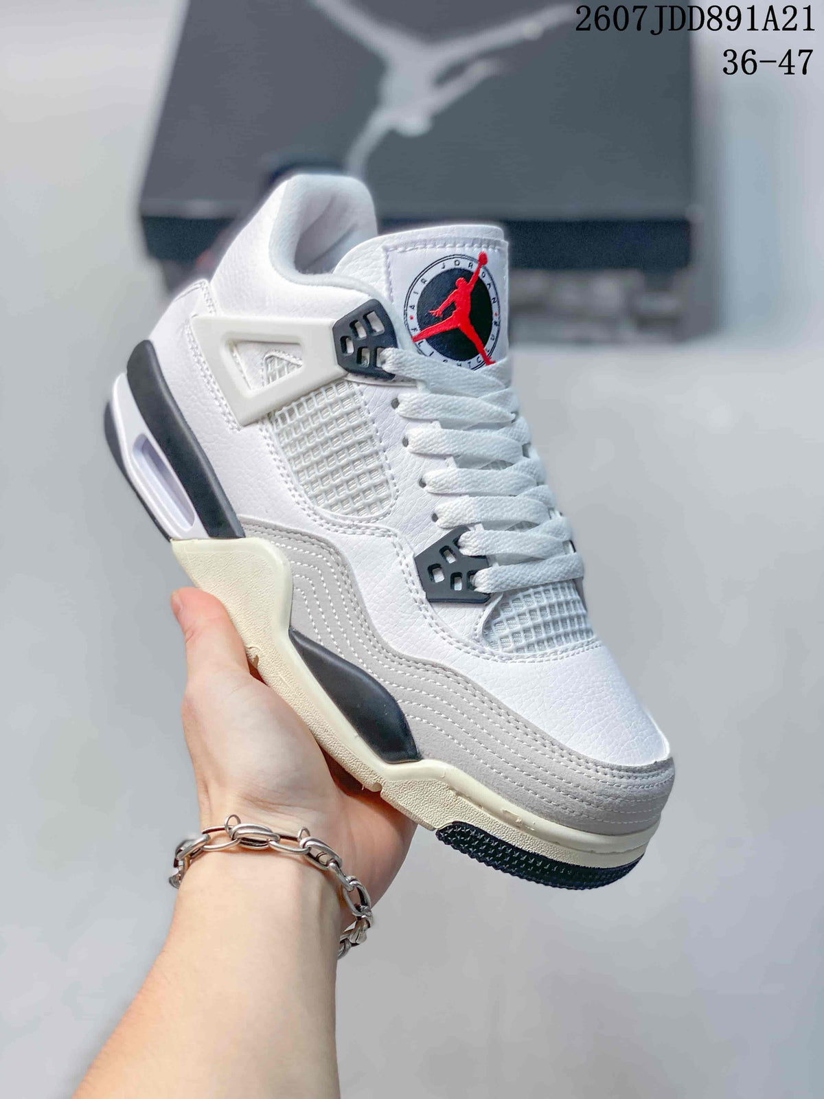 Angled side view showing the white and gray layered upper, black accents, mesh panel, and rubber outsole.