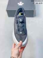 Top view showing the mesh toe area, tongue, BOA dial closure, and dark navy colorway.