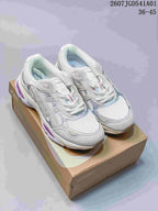 Pair of white and silver ASICS GEL-NYC 2.0 sneakers with lavender accents