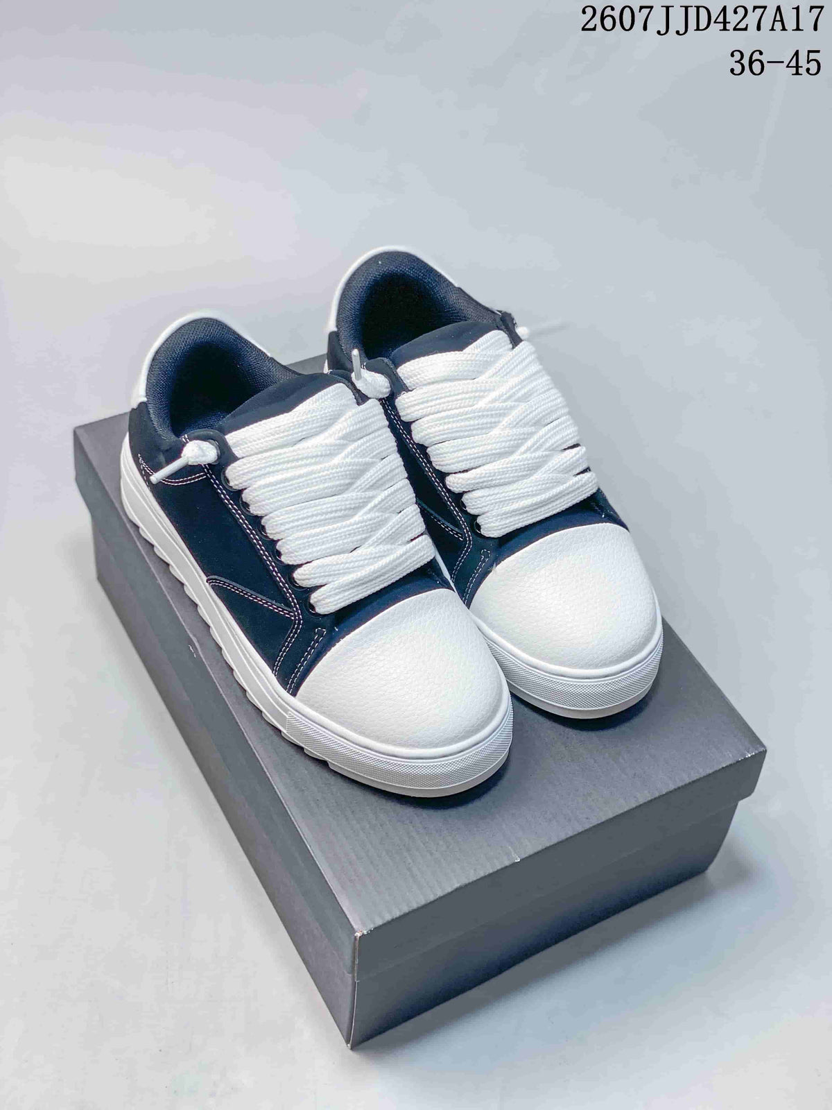 Pair of navy and white Numeris sneakers displayed on a box, with the model code and size range visible above.