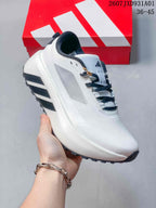 Three-quarter side view of the white sneaker with black accents and thick sole.