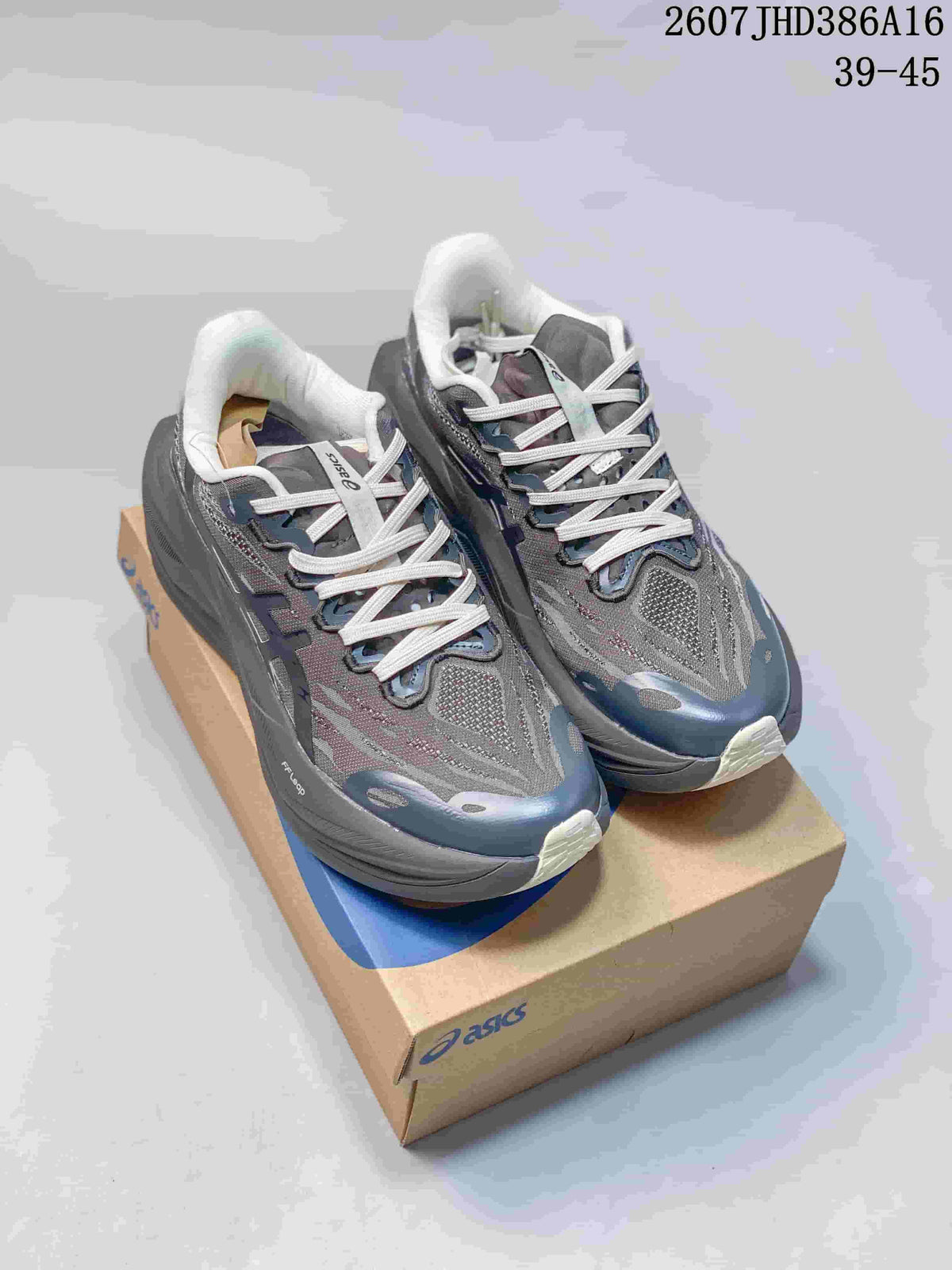 Gray and navy ASICS running sneakers displayed on an ASICS shoe box; image text shows 2607JHD386A16 and 39–45.