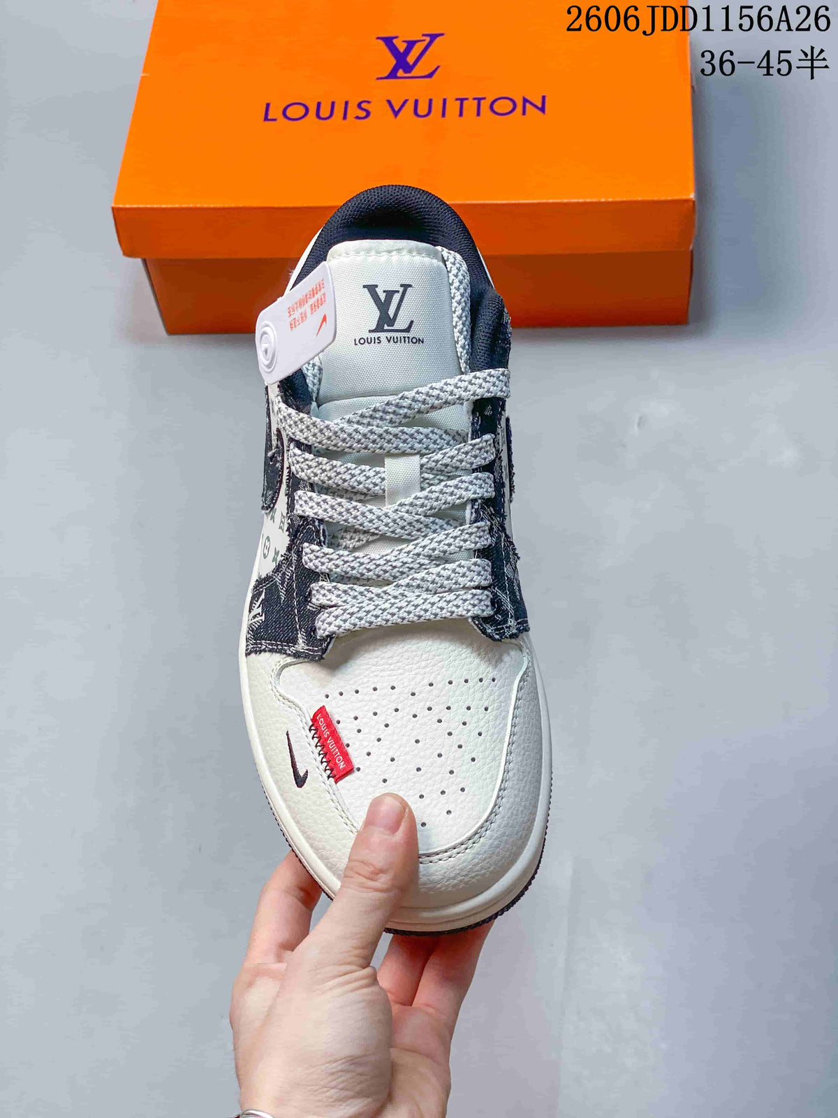 Top view showing the perforated white toe box, grey laces, padded collar and branded tongue.