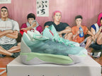 Side profile of a mint-green basketball sneaker with stripe-shaped overlays and a sculpted white and light-green sole.