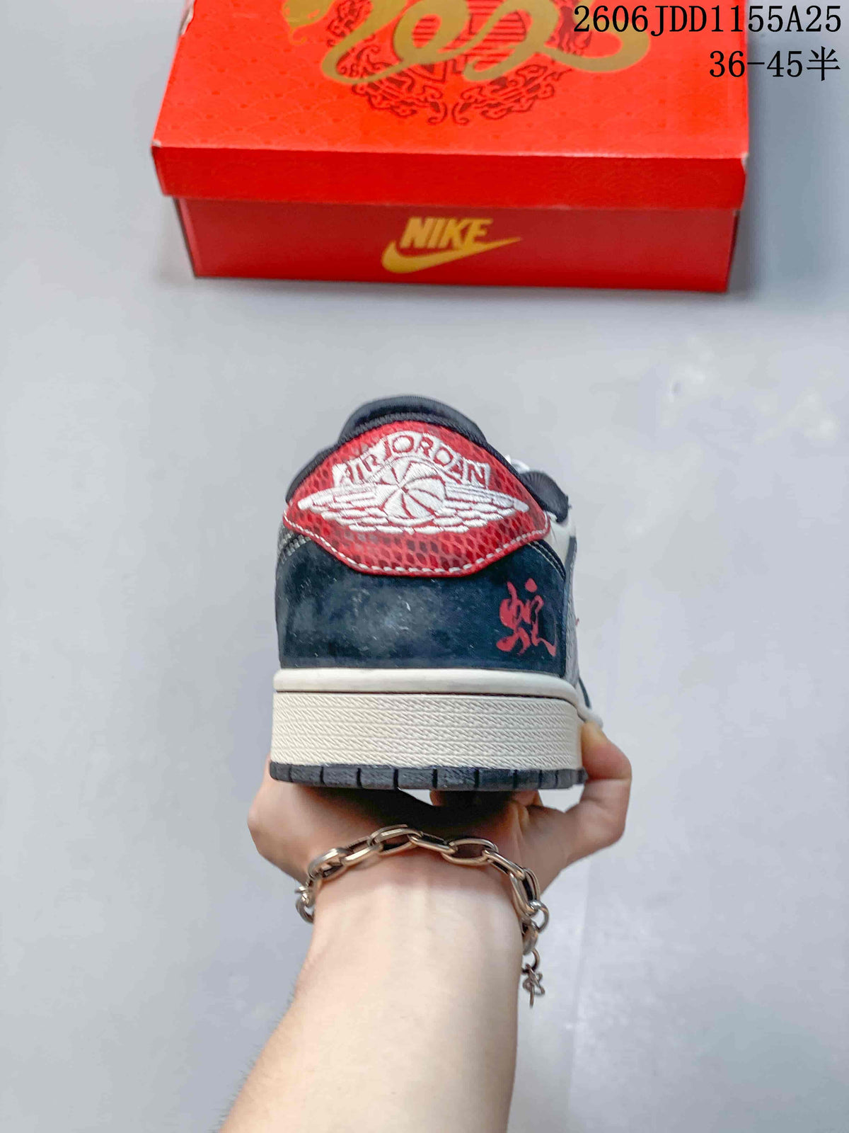 Rear view showing the red tongue label, dark navy heel panel and white midsole.