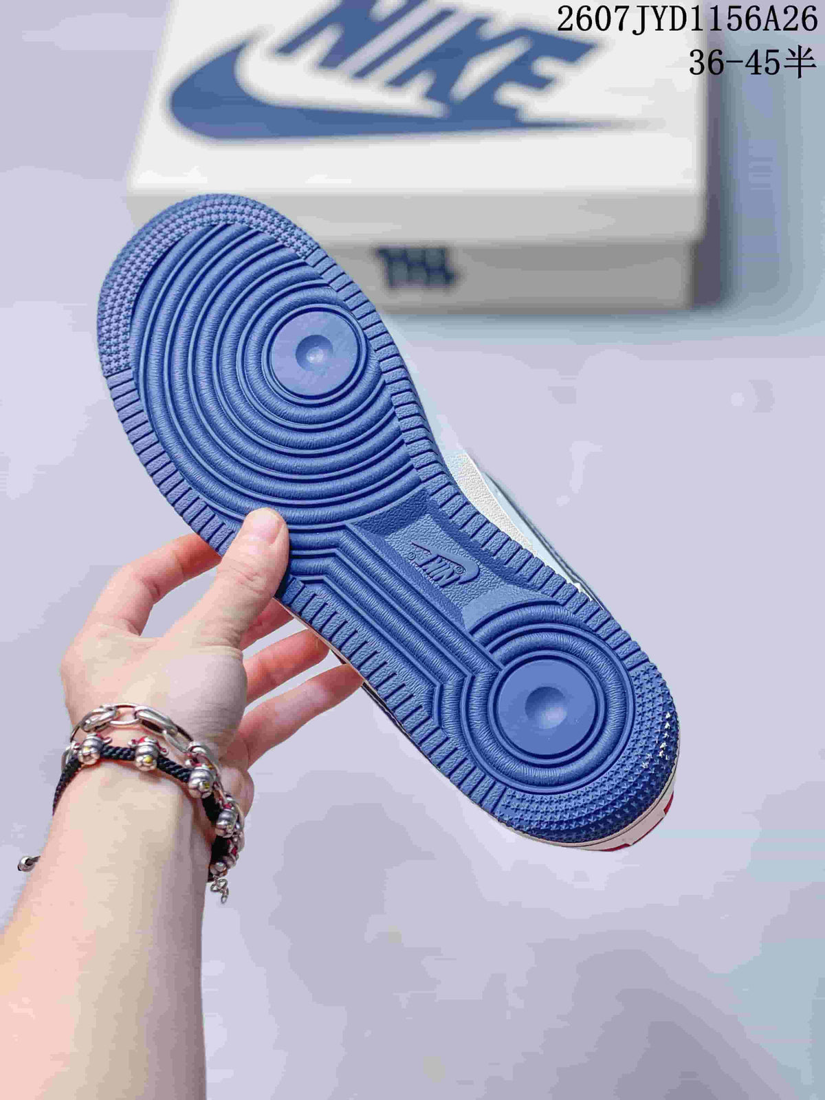 Bottom view showing the blue concentric-pattern outsole of a Nike Air Force 1 sneaker.