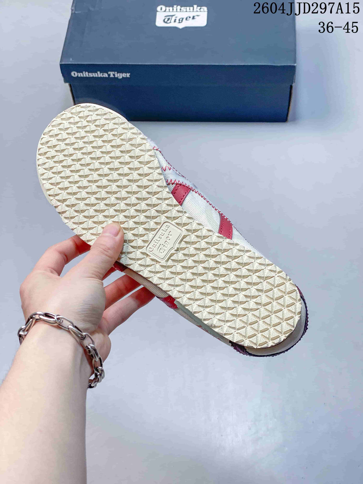 Close view of the patterned rubber outsole and textured tread