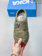 Top view of the mule sneaker showing its textured upper and buckle detail