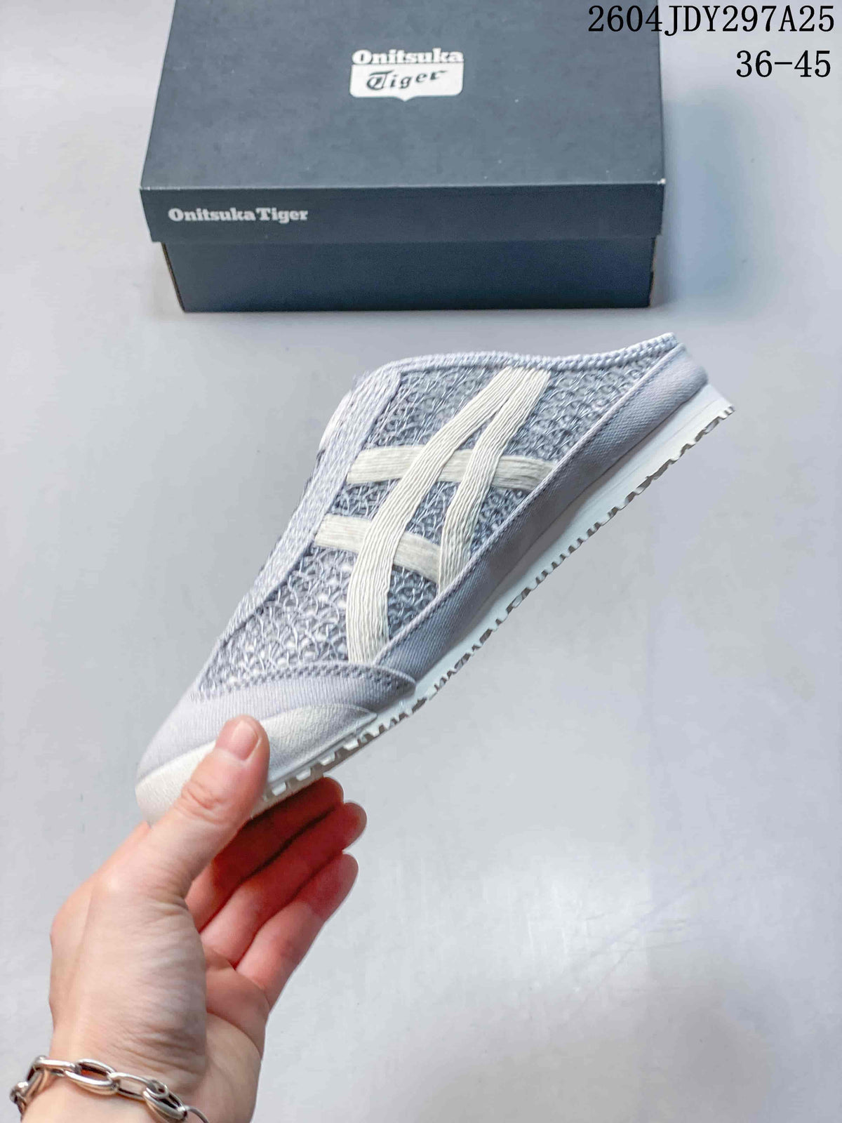 Side profile highlighting the textured upper, contrasting stripes, and low-profile sole.