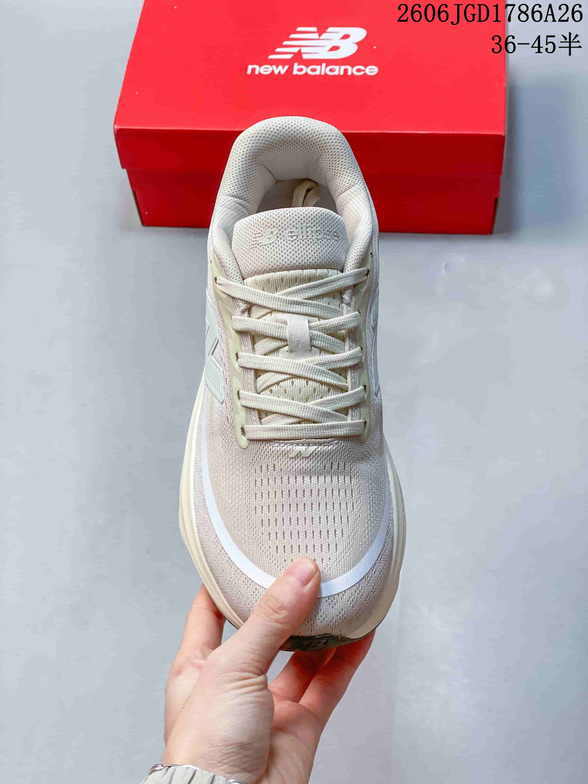 Top view of a lace-up New Balance running shoe with a mesh-looking upper.