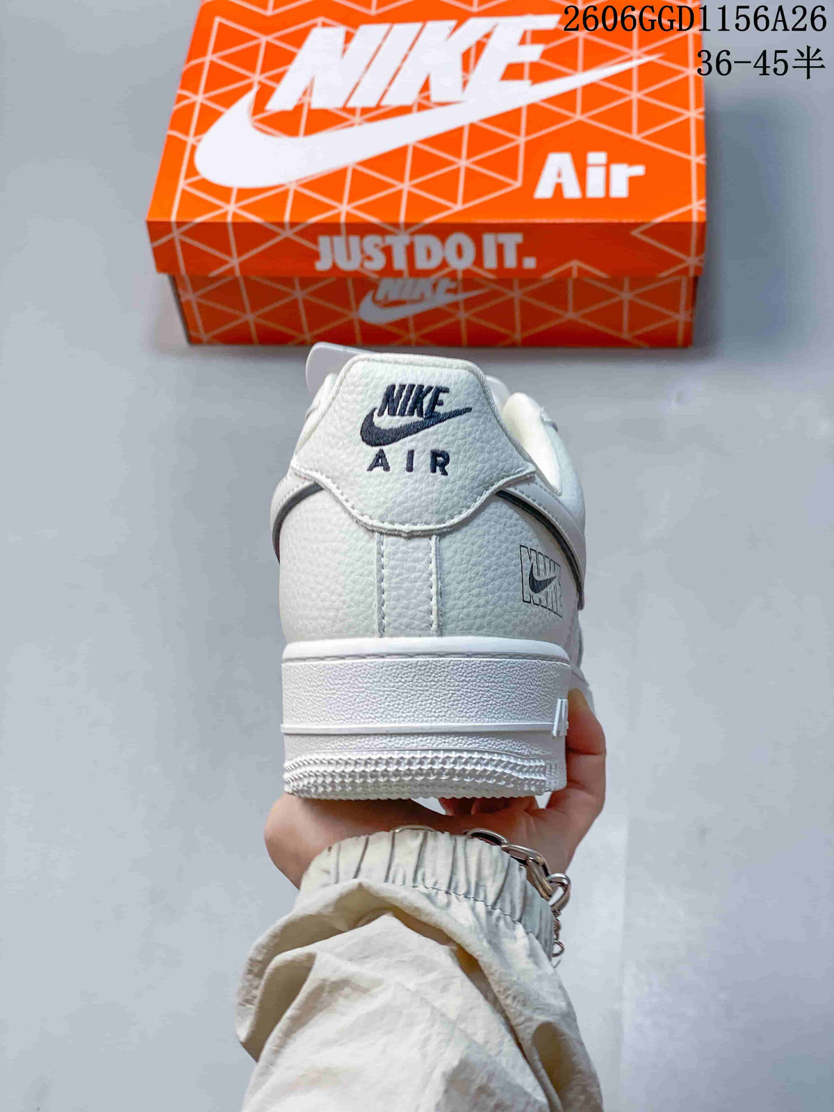 Rear view of a cream-white Air Force 1 sneaker with Nike Air heel branding