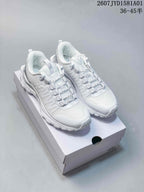 Pair of white Alo Trail sneakers with textured uppers and treaded outsoles.