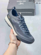Dark gray Arc'teryx Konseal LT W shoe with a light-colored heel section.