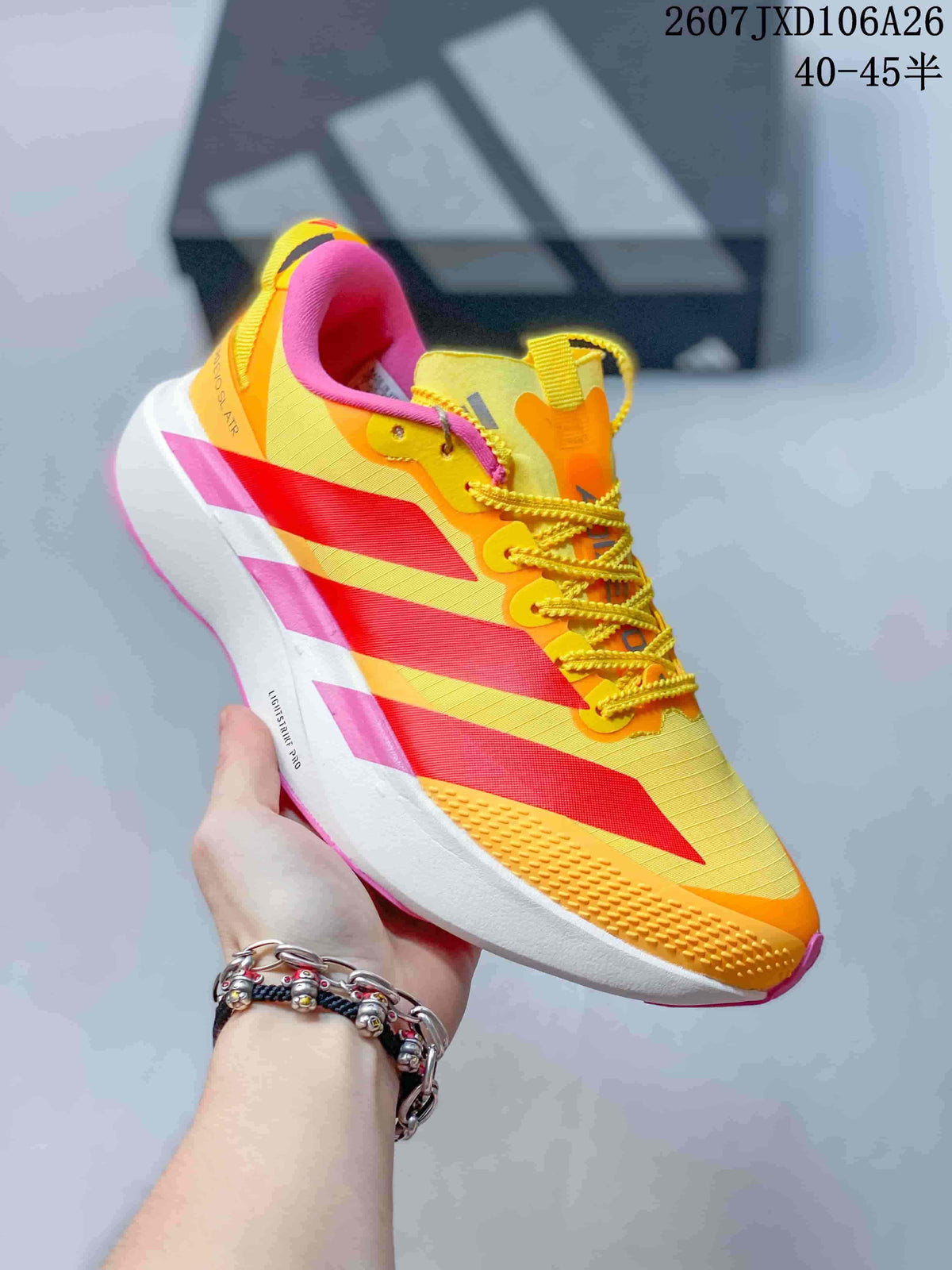 Angled side view showing the colorful upper, contrasting side stripes and layered white midsole.