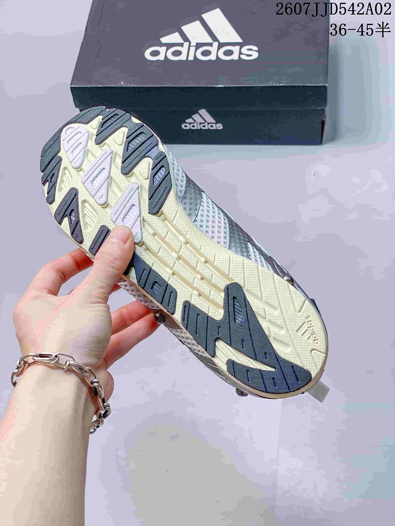 Outsole view showing the sneaker tread and contrasting sections