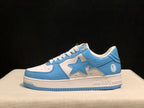 Side profile of a blue and white low-top sneaker showing the large star side panel and BAPE branding on the midsole.