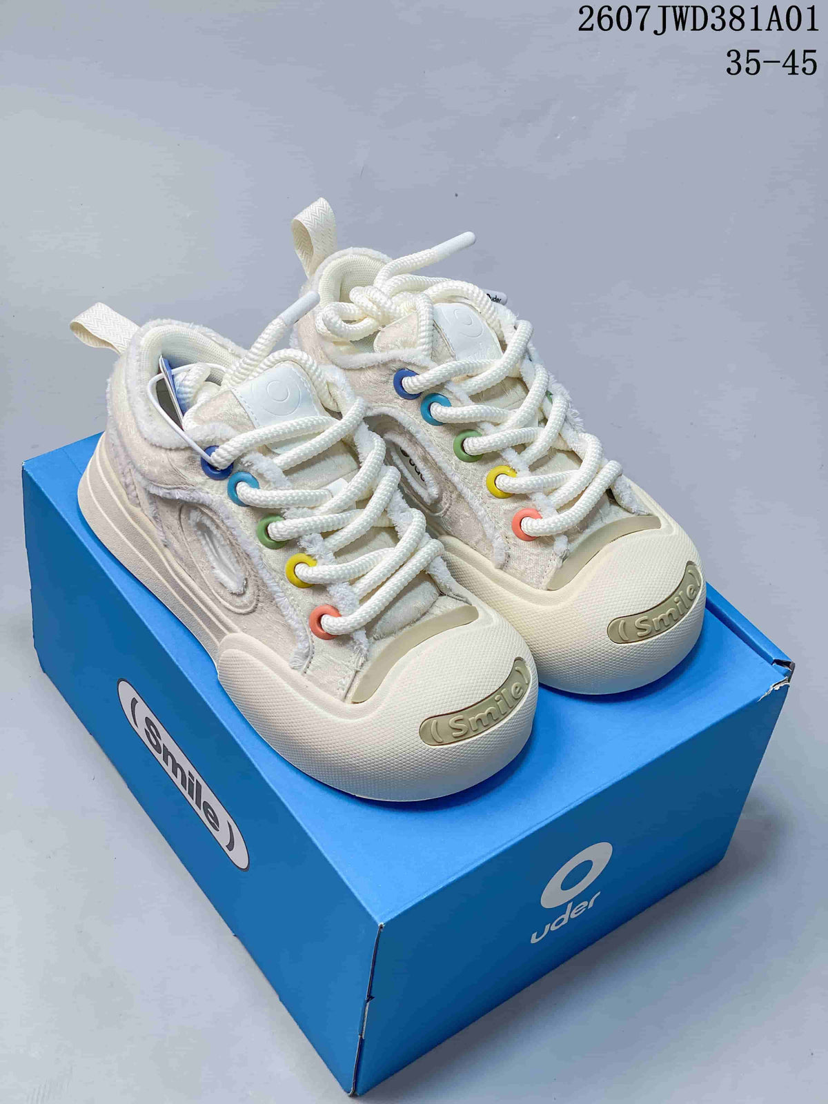 Off-white Ouder chunky sneakers with multicolor eyelets and Smile toe detail.