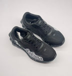 Top angled view of the pair showing black uppers, laces and alo tongue branding.