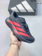 Angled side view of the black and red Adidas Adizero Evo SL sneaker showing its low-top shape, red stripes, and cushioned-looking sole structure.
