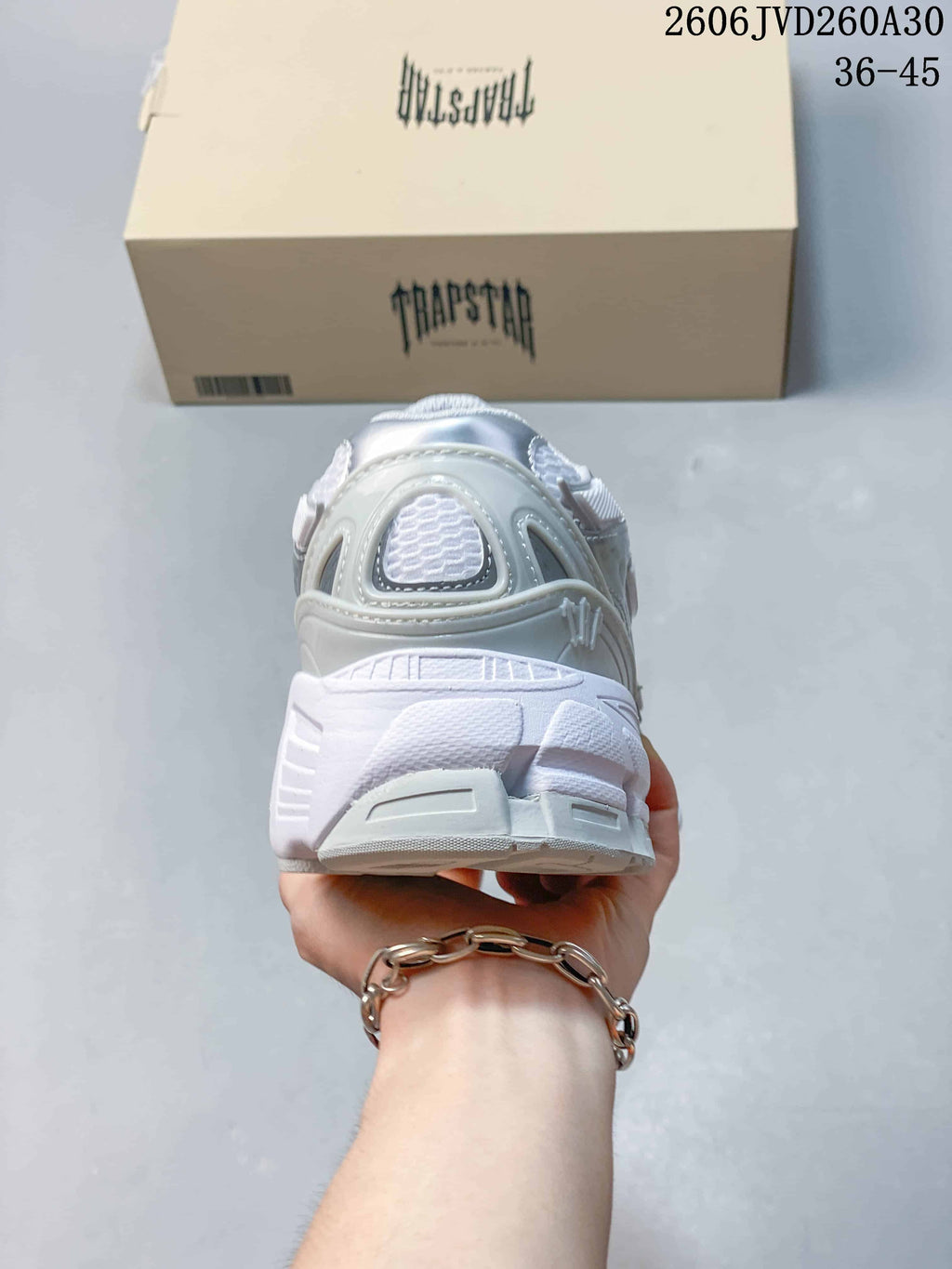 Rear view showing the sculpted heel and outsole of the Trispeed 3000 Trainer