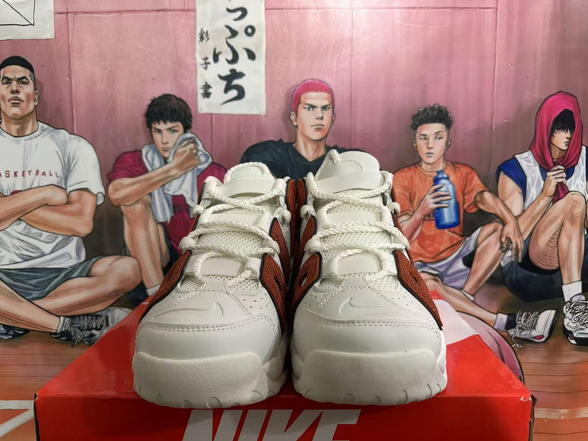 Front view of off-white and brown Nike high-top sneakers with rope-style laces.