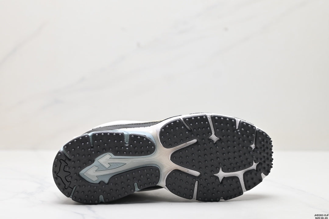 Underside view showing the segmented black outsole with raised traction elements.