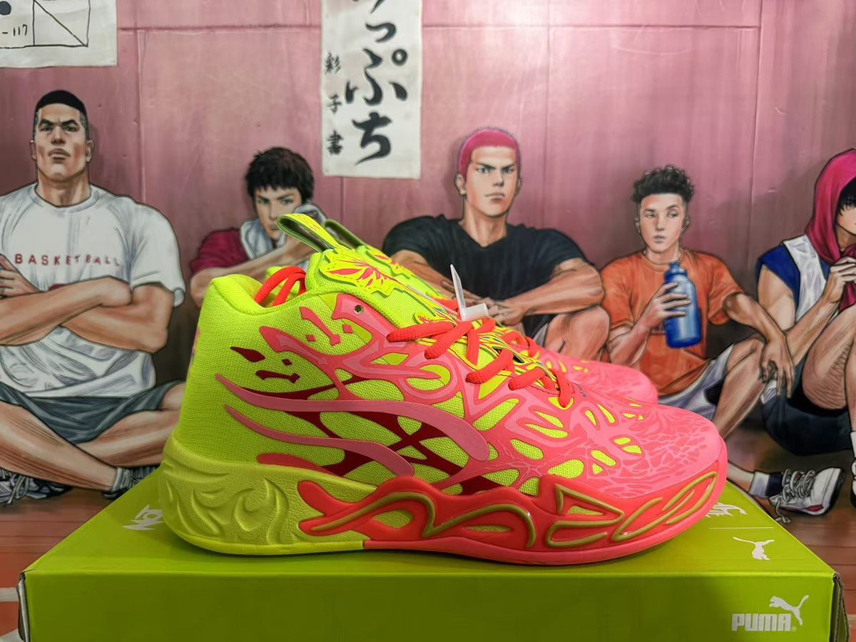 Side view of a lime green and coral PUMA basketball sneaker with sculpted sole details.