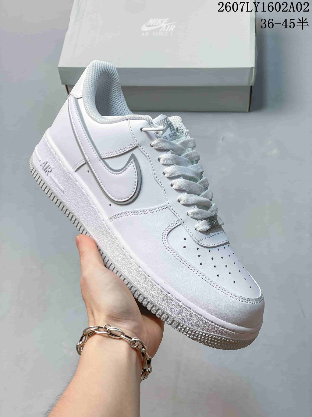 Angled view of a white Nike Air Force 1 '07 sneaker