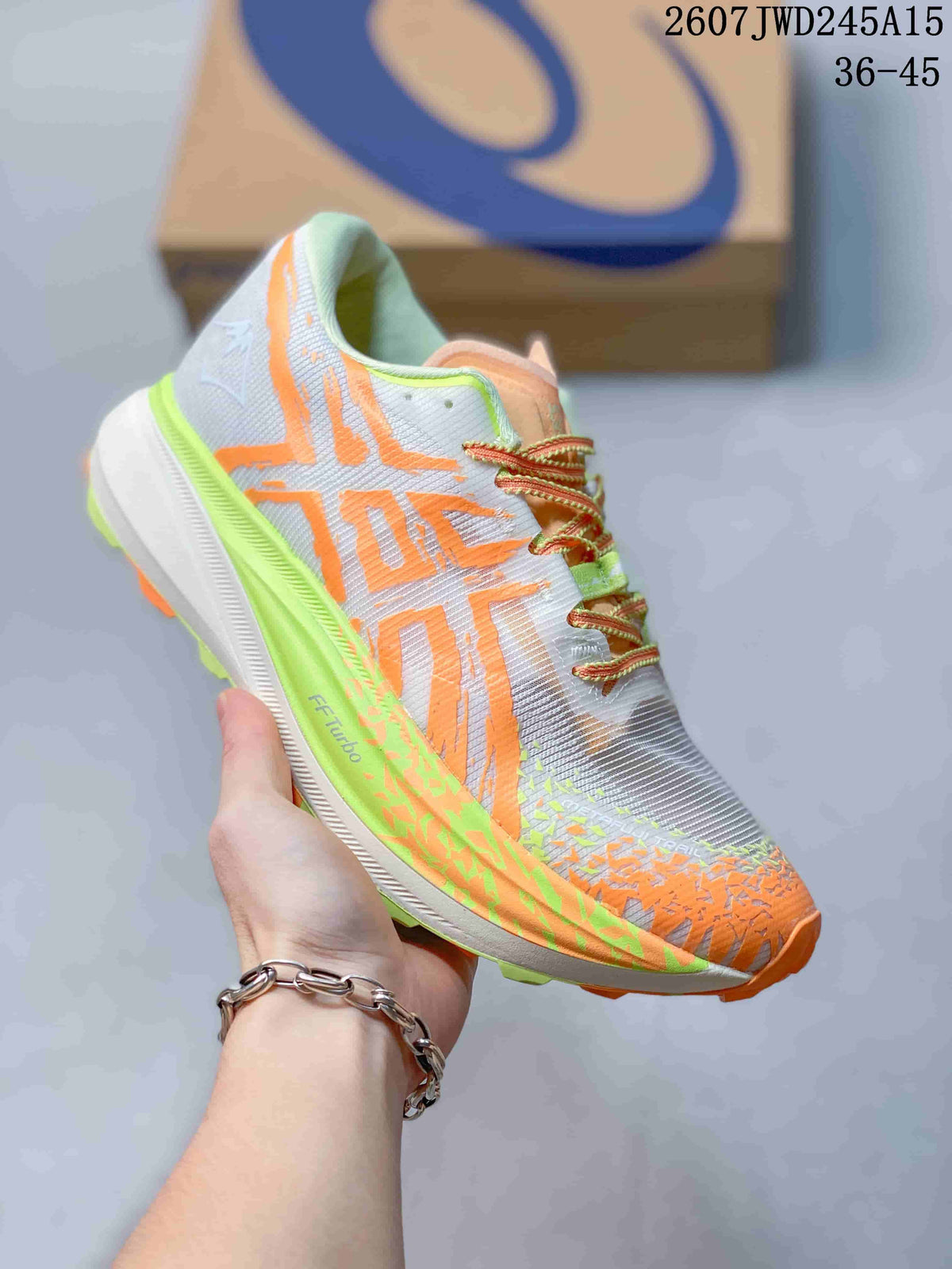 Angled side view of the sneaker showing the orange branding, lime midsole accents and orange outsole details; image text shows code 2607TWD245A15 and sizes 36–45.