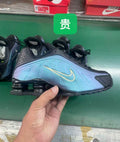 Nike Shox R4 Black and Iridescent Blue Sneakers