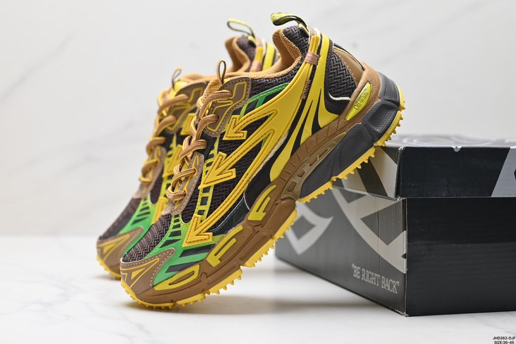 Angled product view showing the side profile, layered panels, heel pull tab, and the branded product box.