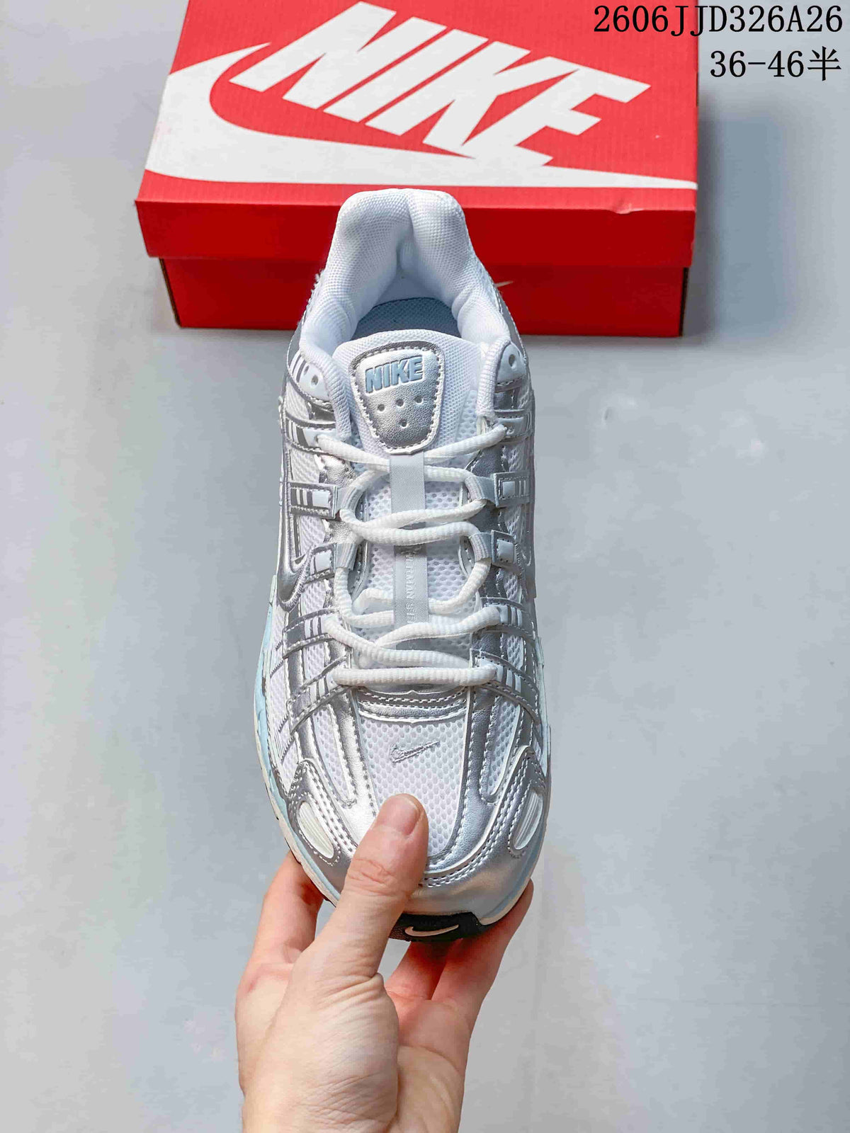 Top view of a silver and white Nike P-6000 sneaker with lace-up closure