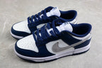 Pair of low-top sneakers shown from an angled front-side view in navy, white, and gray.