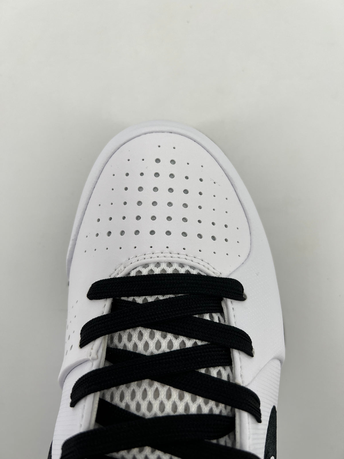 Top view of the shoe toe and laces