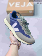Blue and gray VEJA Rio Branco sneaker with contrasting laces, suede-look panels and a cream-colored midsole.
