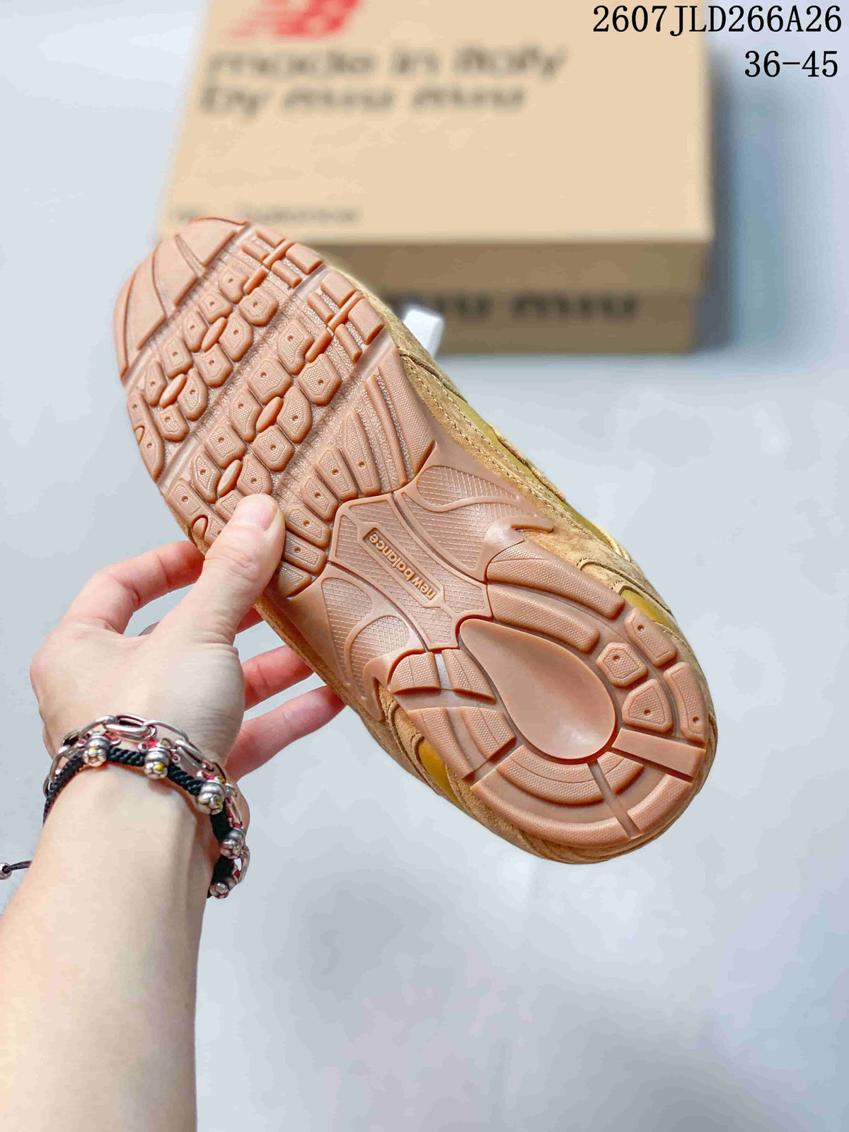 Close-up of the sneaker outsole showing a textured tread pattern and New Balance branding.