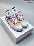 Pair of white and gray Jordan 4-style sneakers with bright pink details and gradient panels, shown from the front.