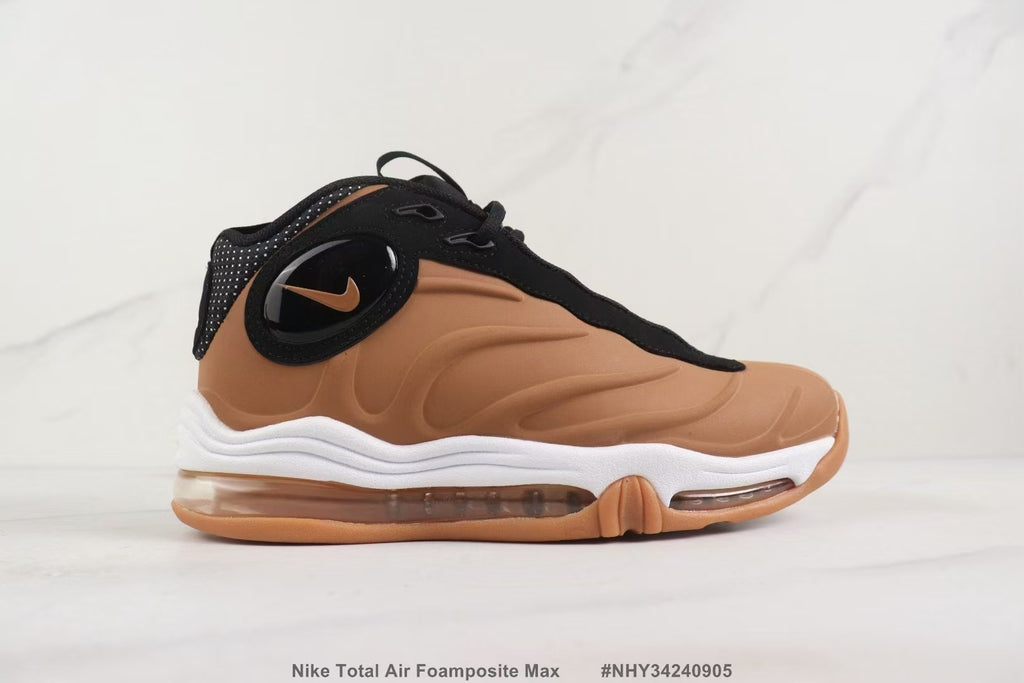 Side profile of the brown sneaker with black trim and a white midsole