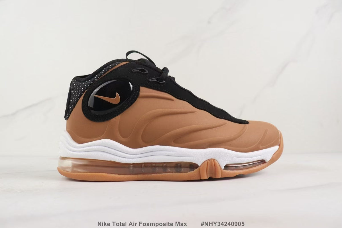 Side profile of the brown sneaker with black trim and a white midsole