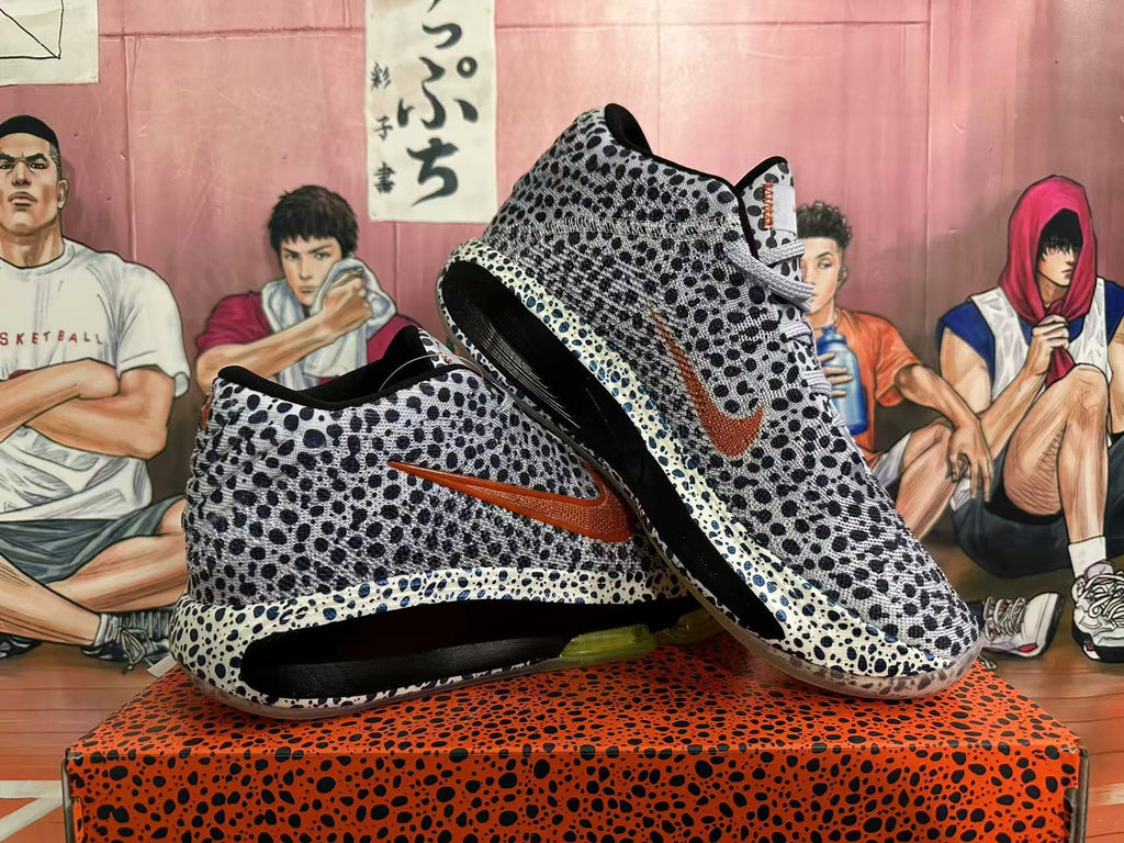 Angled view of the spotted Nike basketball shoes and their sole units