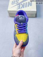 Top view showing purple laces and a perforated yellow toe panel